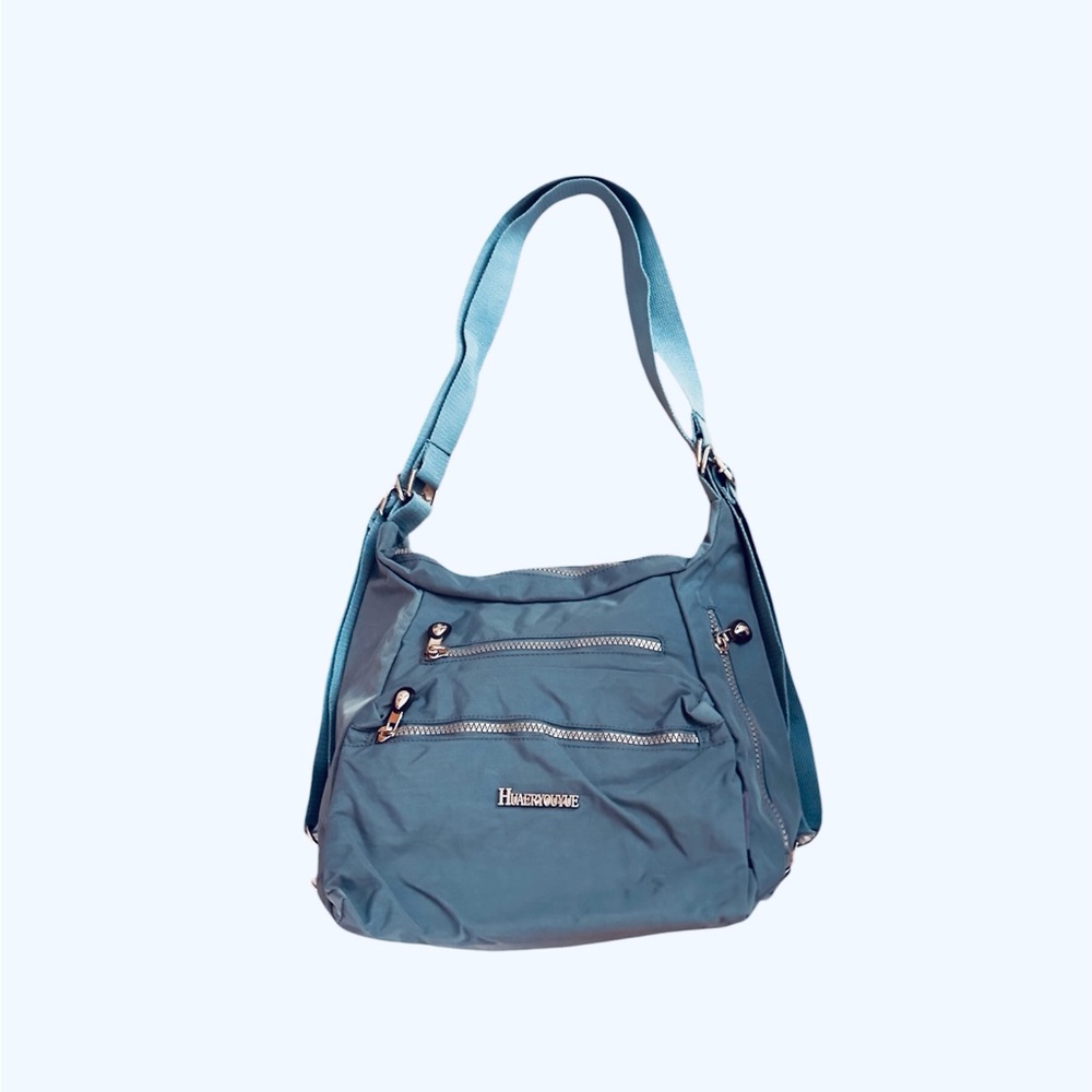 Blue Crossbody Bag with Adjustable Strap and Silver Hardware